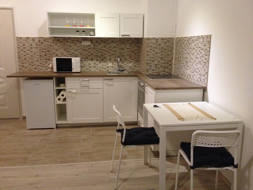 Апартаменты Dozsa Apartman Гёдёллё Номер фото